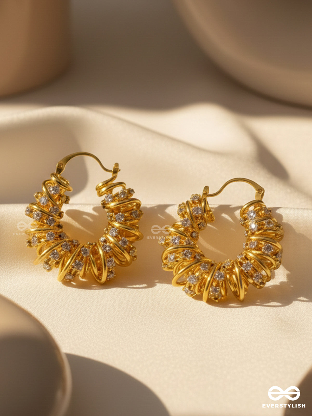 Lustrous Swirls- Intricate Twisted Gold Earrings With Shimmering Stone