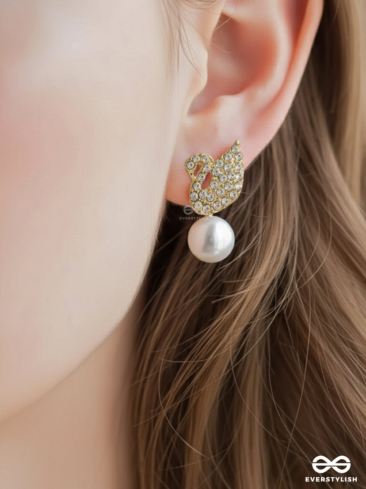 Celeste Swan - Radiant Winged Studs With A Classic Pearl Drop