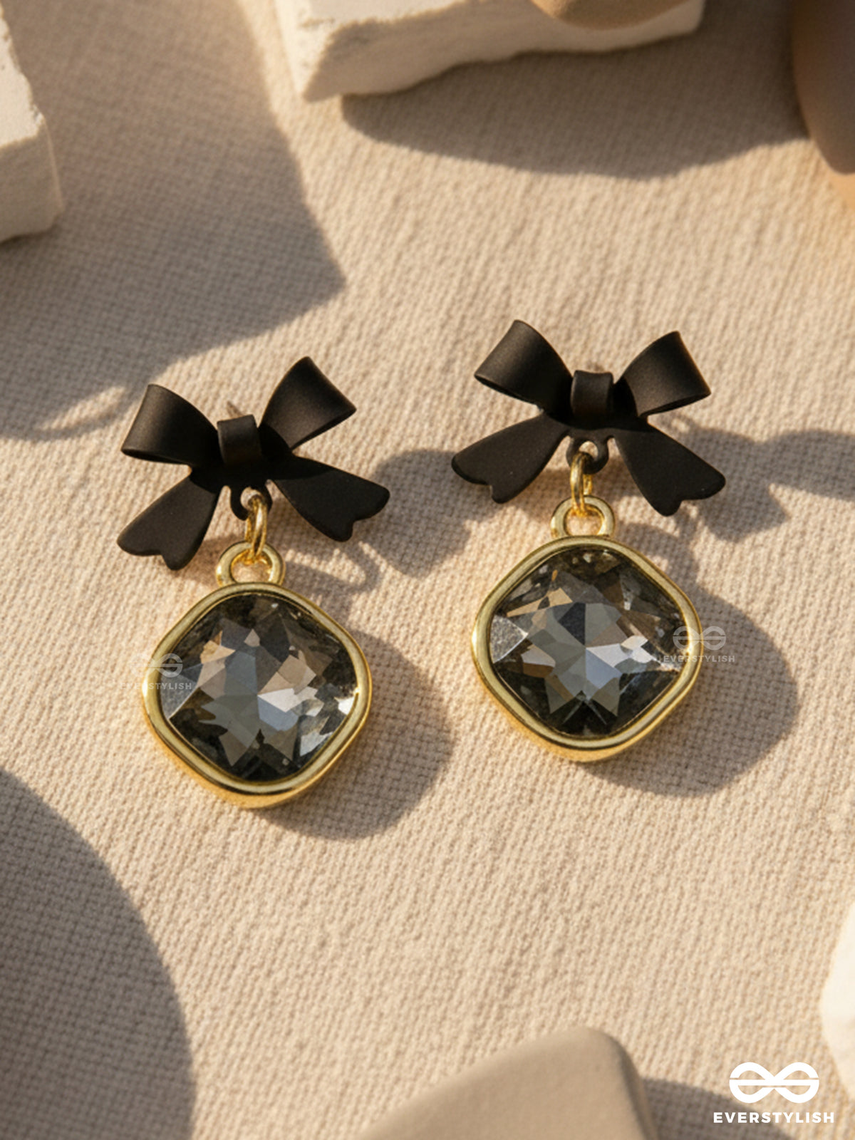 Night Whispers - Chic Bow Earrings With Glossy Black Gemstones