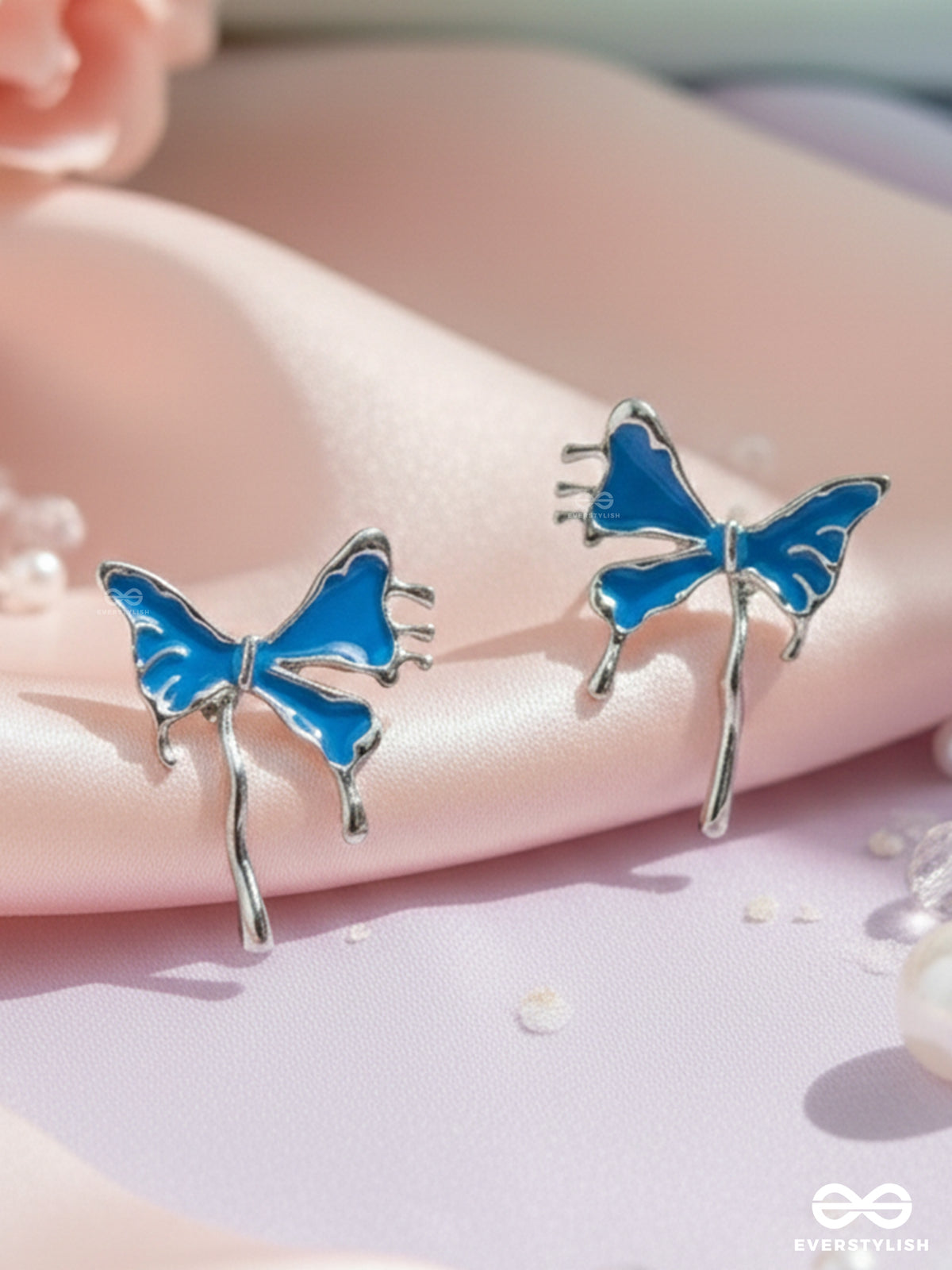 Frosty Fling - Playful Blue Bow Earrings
