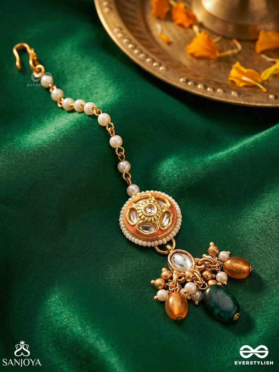 Suramukhi - Divine Face - Ornamental Maangtika With Enamelled Medallion And Gem Drop Cluster