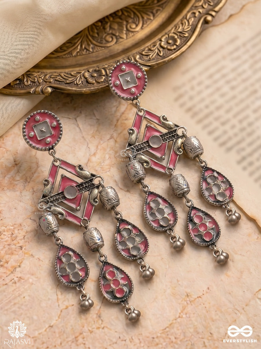 Chandrang - Oxidised Earrings With Ornate Panels And Red Dangling Charms