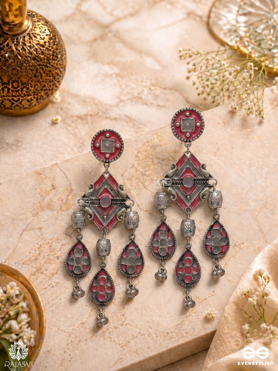 Chandrang - Oxidised Earrings With Ornate Panels And Red Dangling Charms