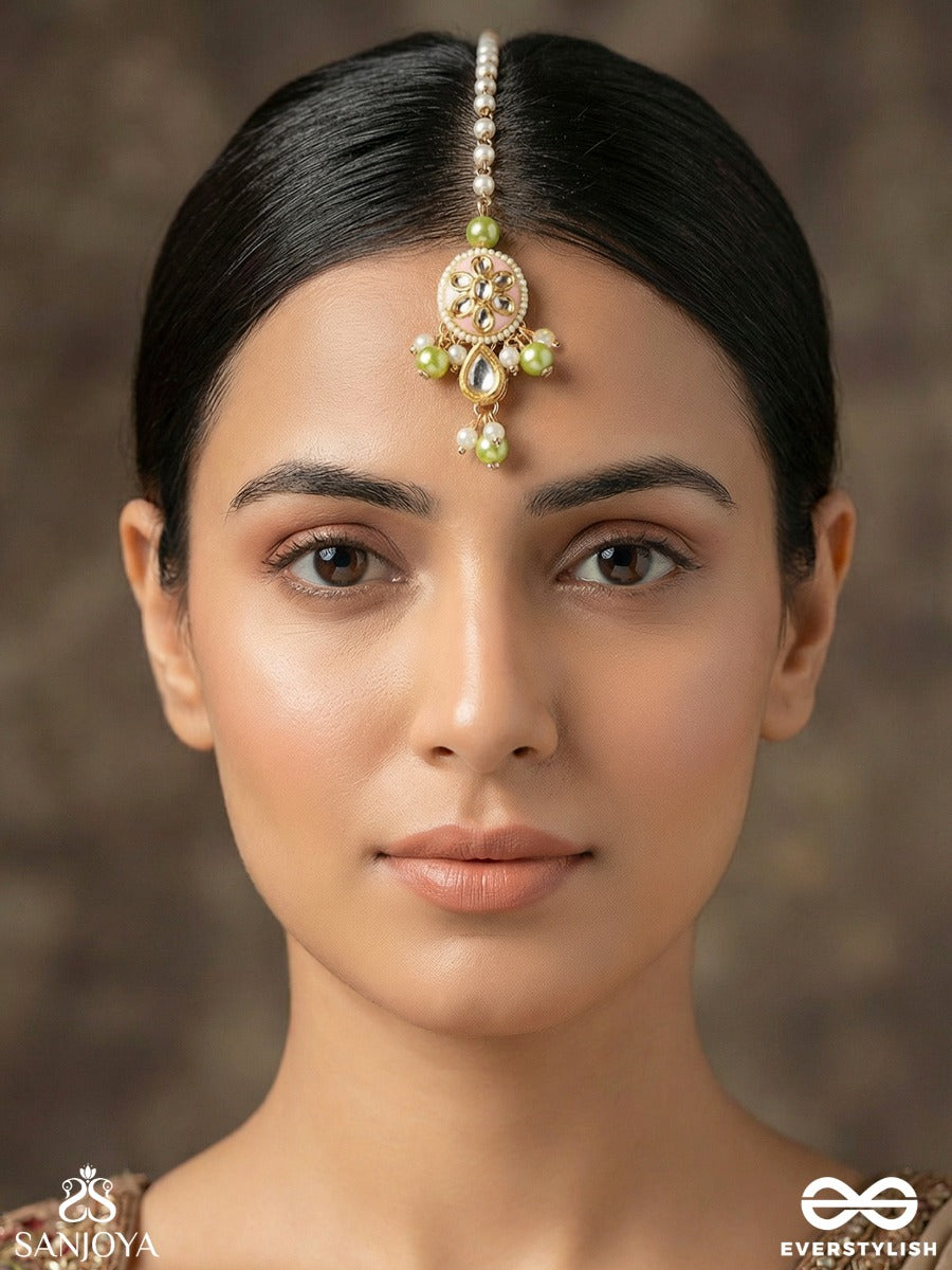 Vasukamini - Treasured Beauty - Elegant Maangtika With Gemmed Bloom And Green Bead Details