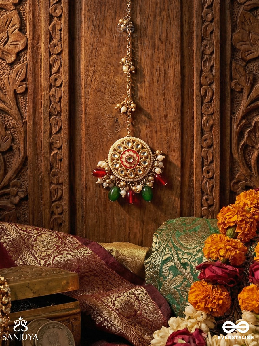 Kanakchitrini - Golden Artistry - Delicate Maangtika With Ornamental Disc, Gem Details And Dangling Accents