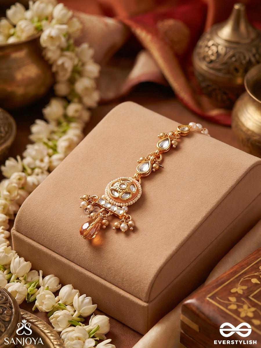 Kesarnoor – Saffron Glow – Elegant Maangtika With Ornamental Motifs And Flowing Accents