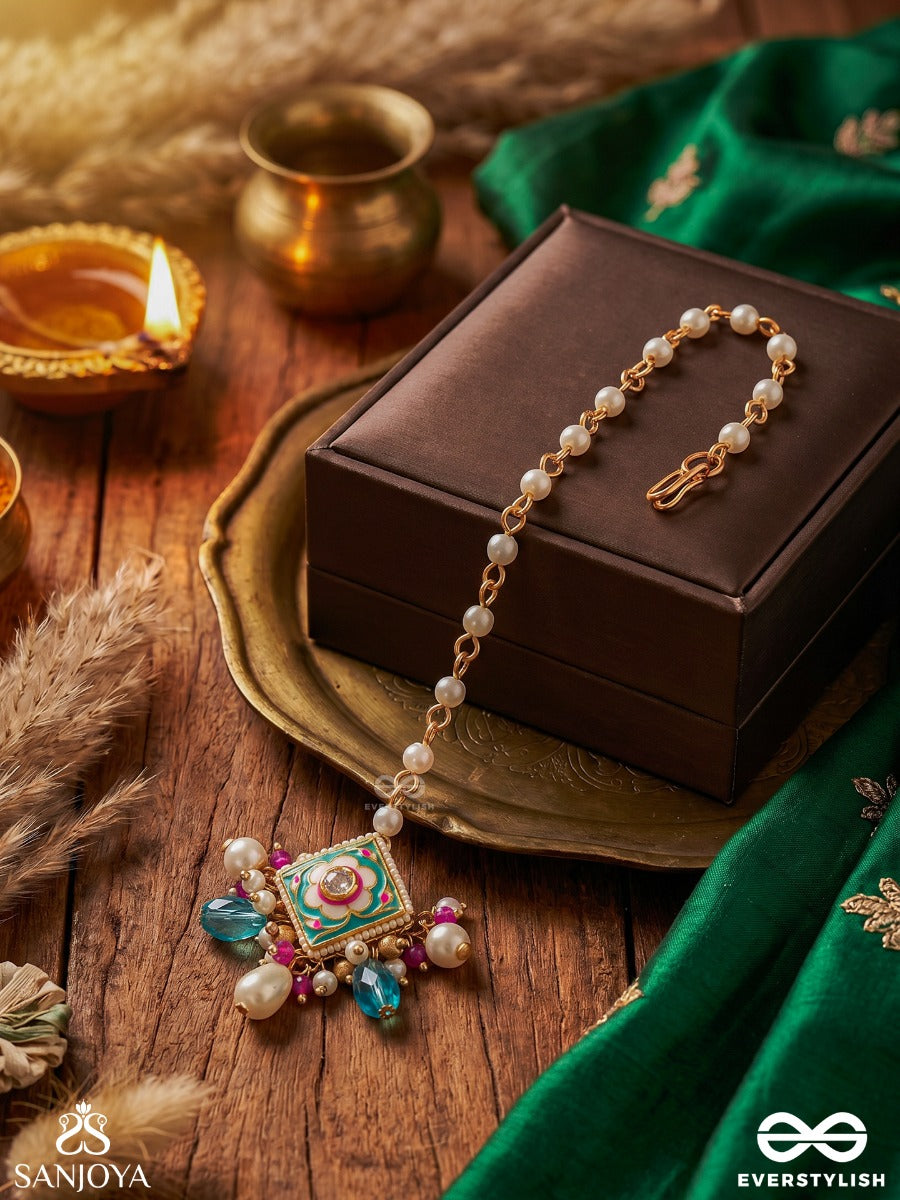 Chitrapradipa - Ornate Light – Ornate Maangtika With Flower-Inspired Center, White Pearl Accents And Soft Blue Danglers