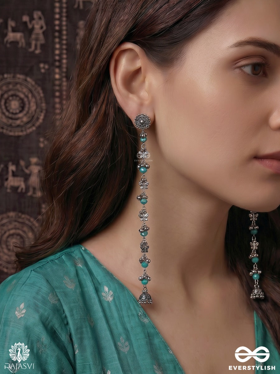 Neel Vatika - Oxidised Statement Earrings With Blue Bead Accents And Antique Floral Motifs