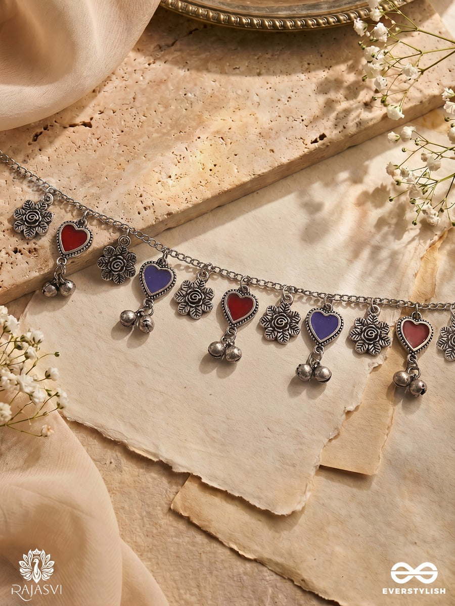 Mohini Taal - Oxidised Necklace With Heart Charms, Floral Links And Ghungroo Drops