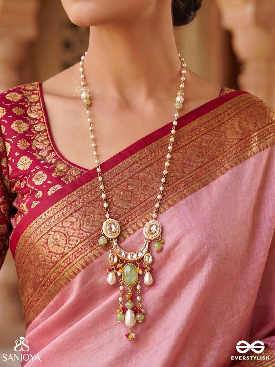Taraleena – Flowing Beauty – Festive Necklace With Decorative Green Detail, Curved Side Motifs And Colourful Drop Accents