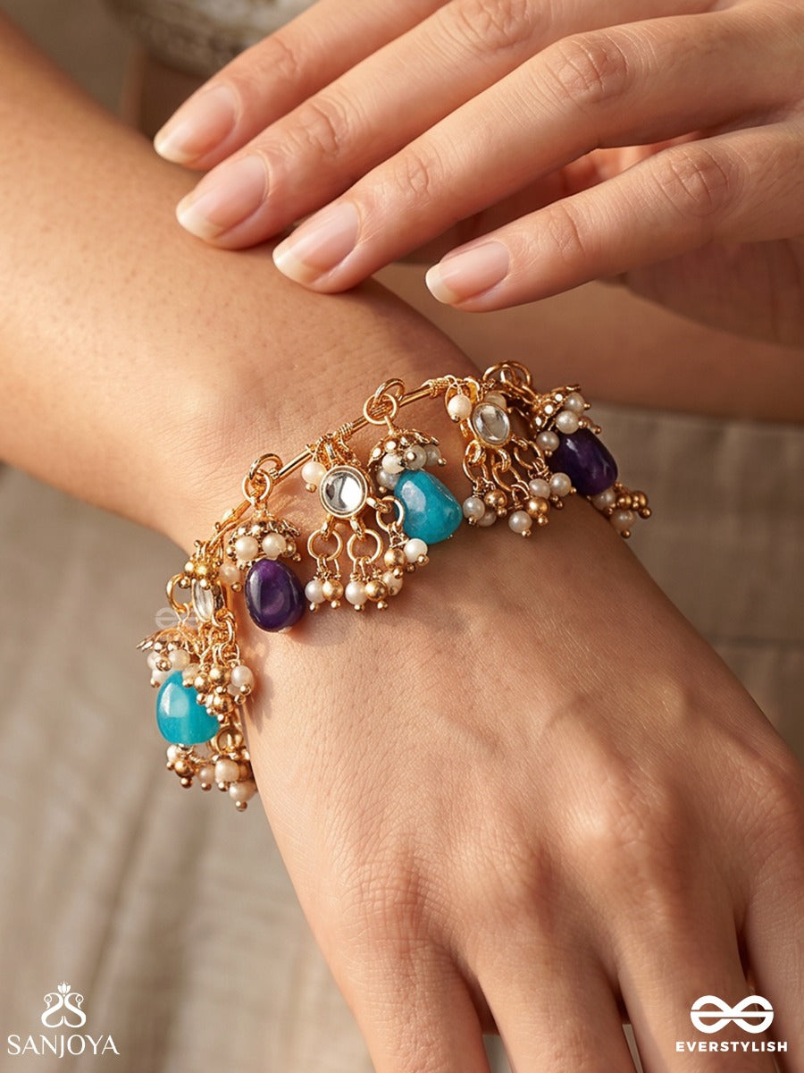 Sajraani – Adorned Royalty – Festive Single Piece Bracelet With Gold-Tone Charm Clusters, Mirror Details, Aqua Drops And Purple Bead Hangings
