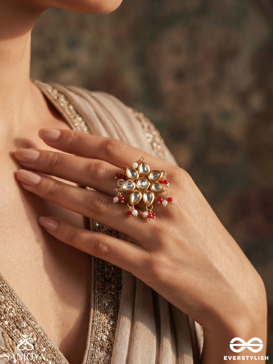 Suryaphool – Sun Bloom – Ornate Ring With Sun-Like Floral Motif, Mirror-Style Stonework, Gold-Tone Frame And Red Bead Accents