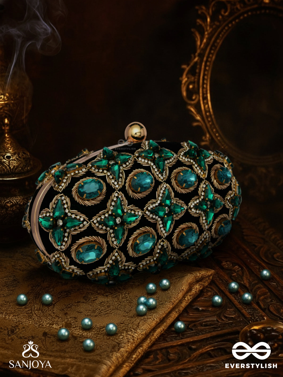 Neelzara – Oval Dark Green Velvet Clutch With Intricate Stone And Zardozi Work And Golden Metal Frame