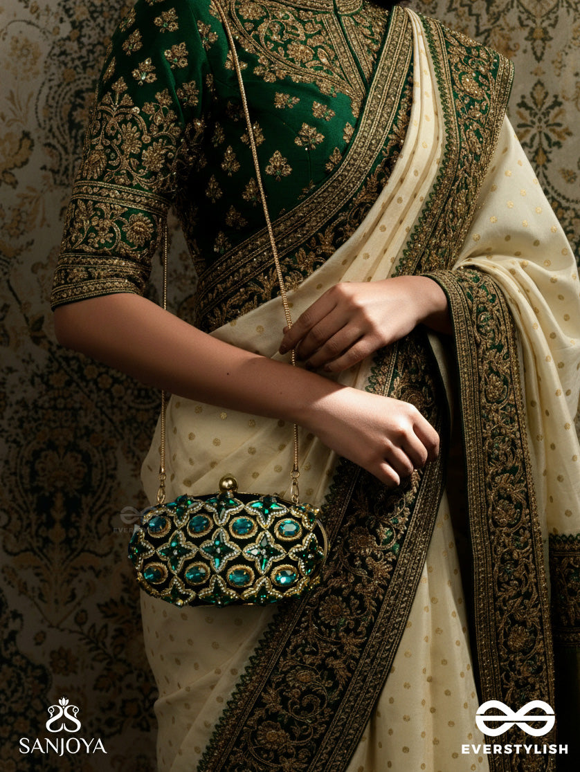 Neelzara – Oval Dark Green Velvet Clutch With Intricate Stone And Zardozi Work And Golden Metal Frame
