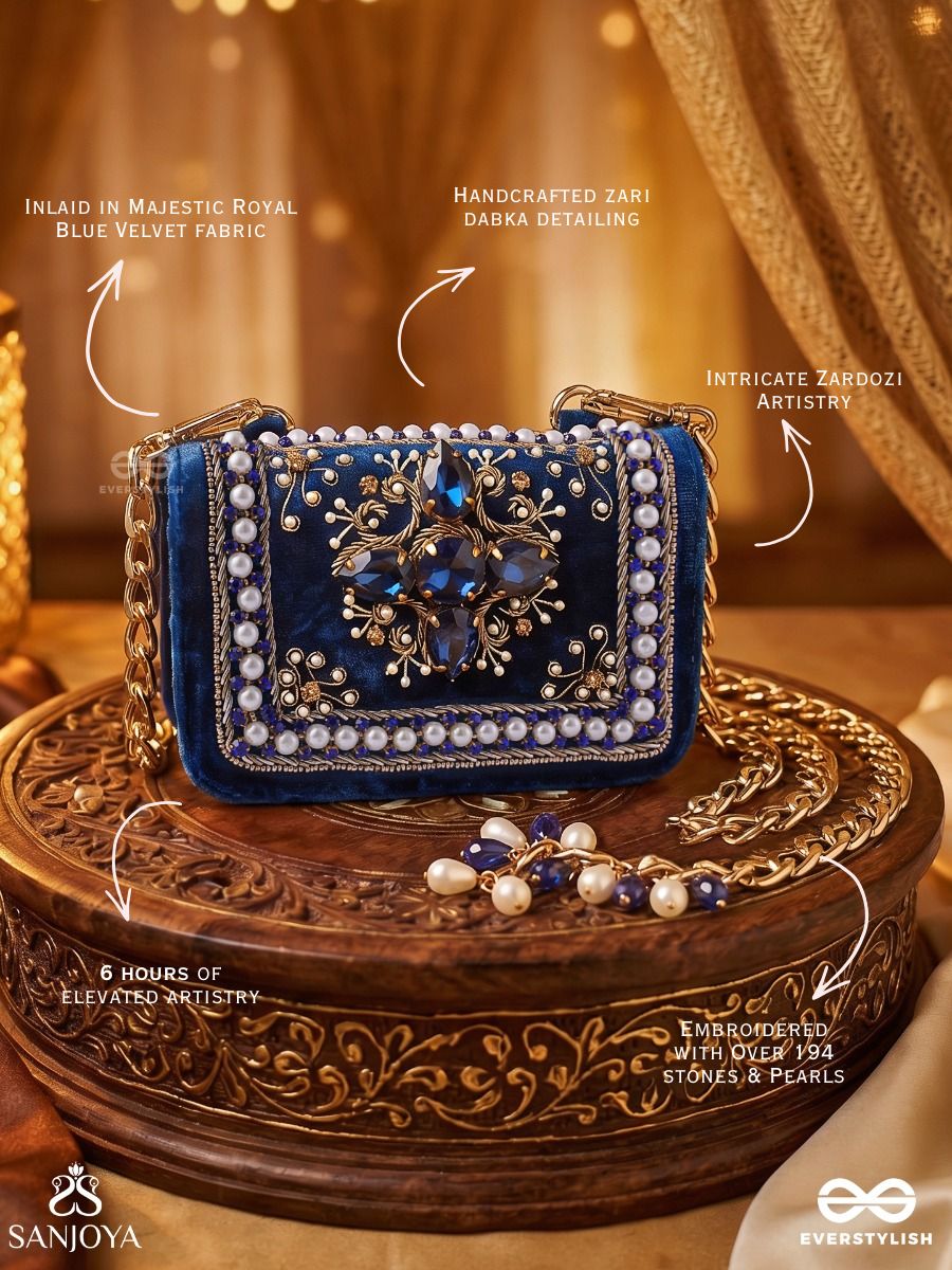 Kadambari – Rectangular Royal Blue Velvet Clutch With Ornate Gem Embellishment, Pearl Framework And Tassel Detail