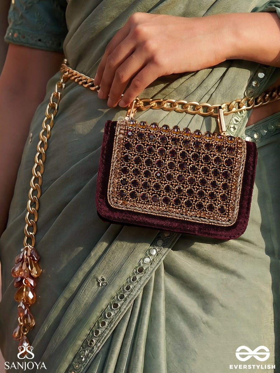Ratnapriya – Rectangular Wine Velvet Clutch With Ruby Gem Lattice Embellishment, Gold Framework And Gem Tassel