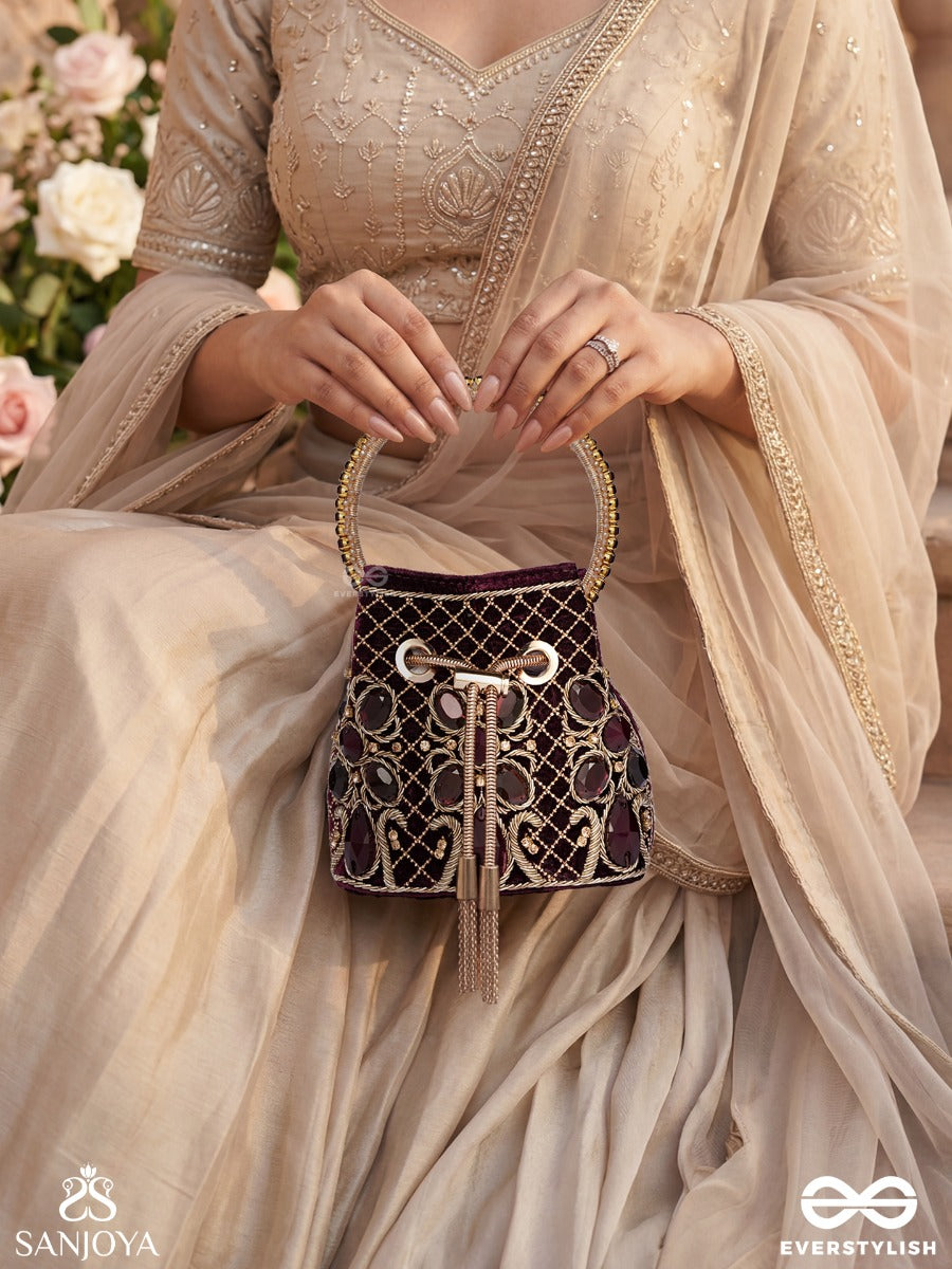 Zareen – Bucket Rich Maroon Velvet Bag With Mirror Gridwork, Braided Cord Closure And Embellished Grip Handle