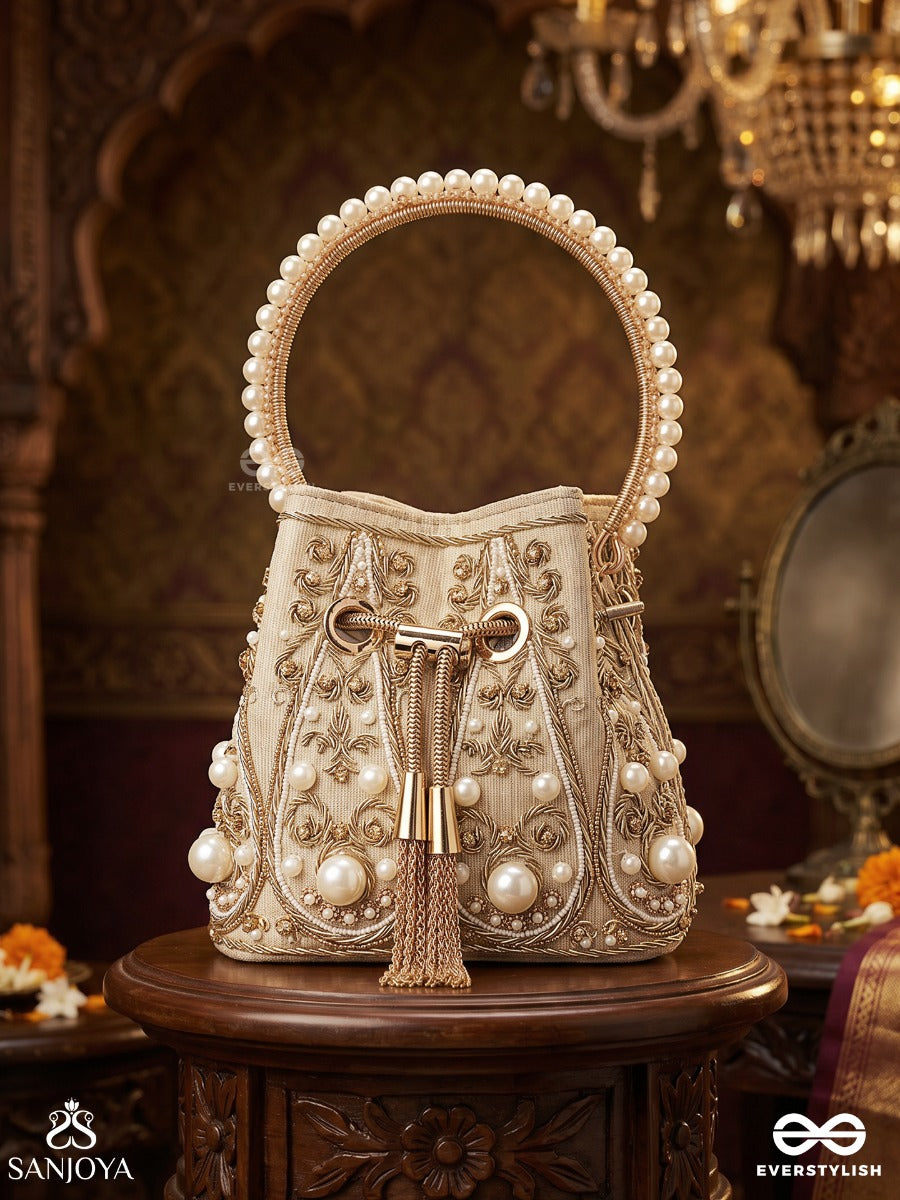 Humayra – Bucket Pale Beige Velvet Bag With Floral Pearl Work, Drawstring Closure And Decorative Ring Handle