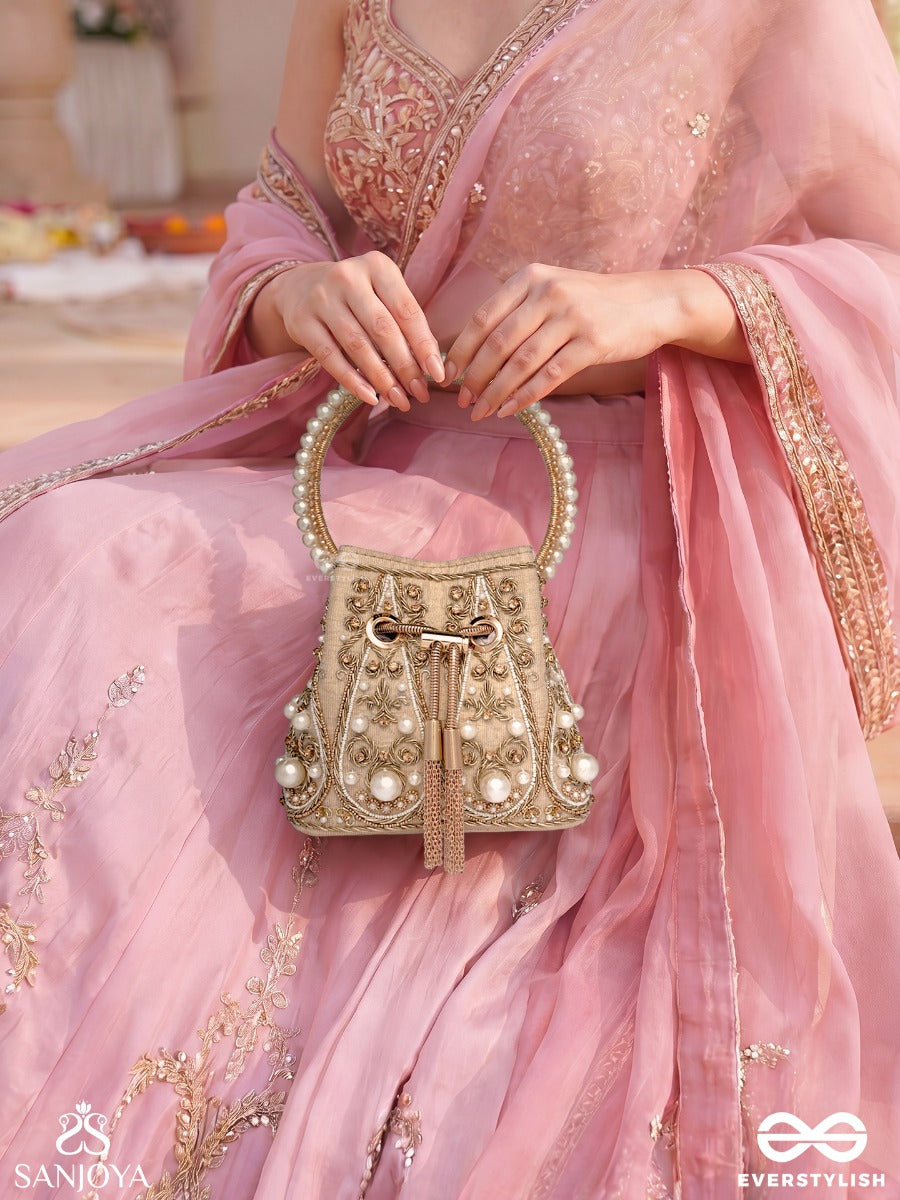 Humayra – Bucket Pale Beige Velvet Bag With Floral Pearl Work, Drawstring Closure And Decorative Ring Handle