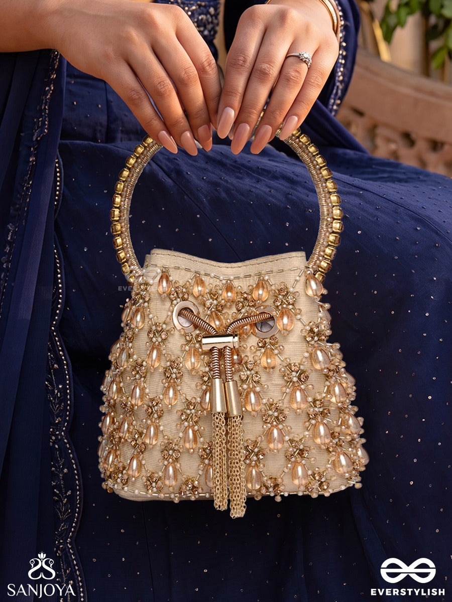 Rumana – Bucket Pale Champagne Base Bag With Cascade Pearl Detailing, Cord Lock And Embellished Handle