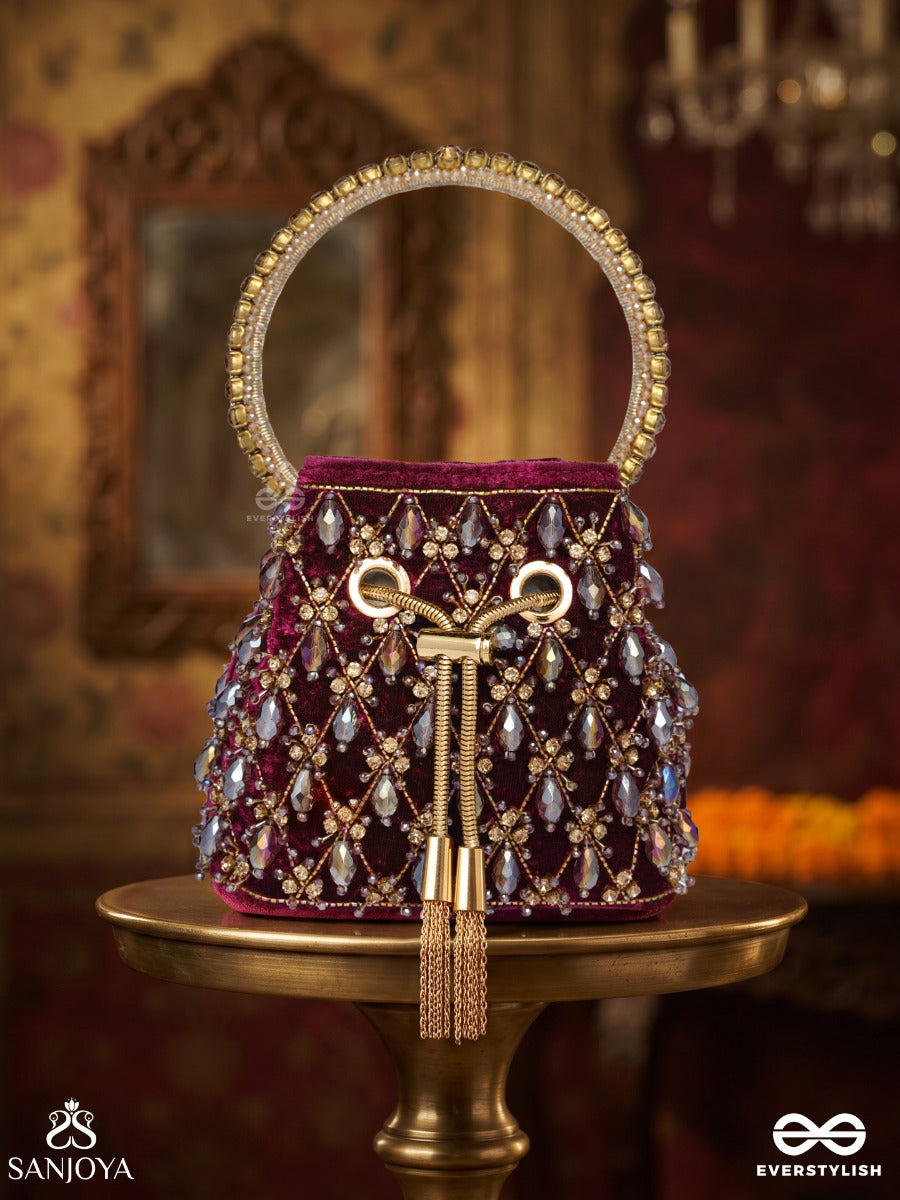 Tahira – Bucket Royal Berry Velvet Bag With Teardrop Gem Panel, Metallic Tie-Up And Ornate Handle