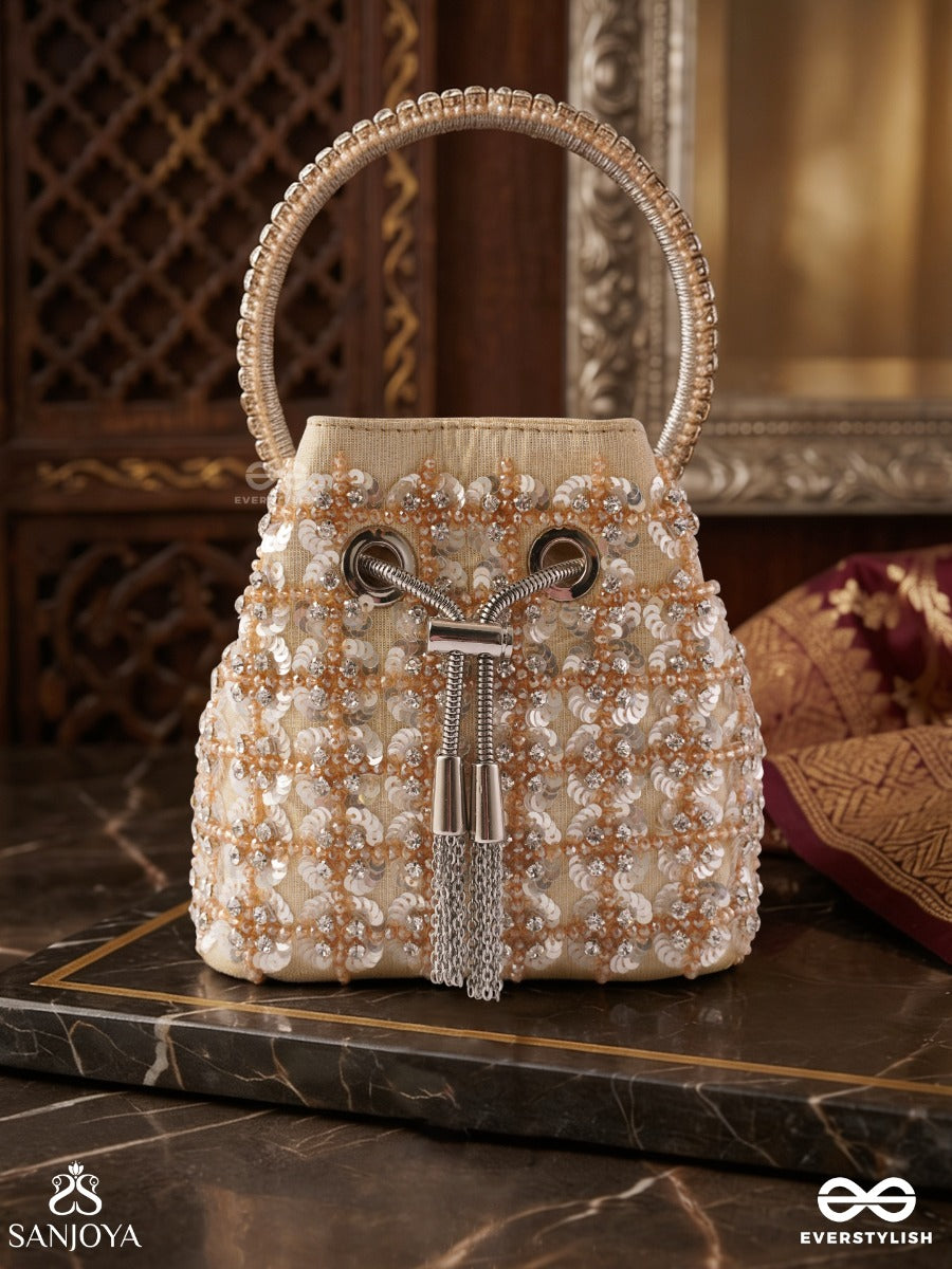 Mehryar – Bucket Ivory Base Bag With Pearl Lattice Texture, Metallic Drawstring And Ring Handle