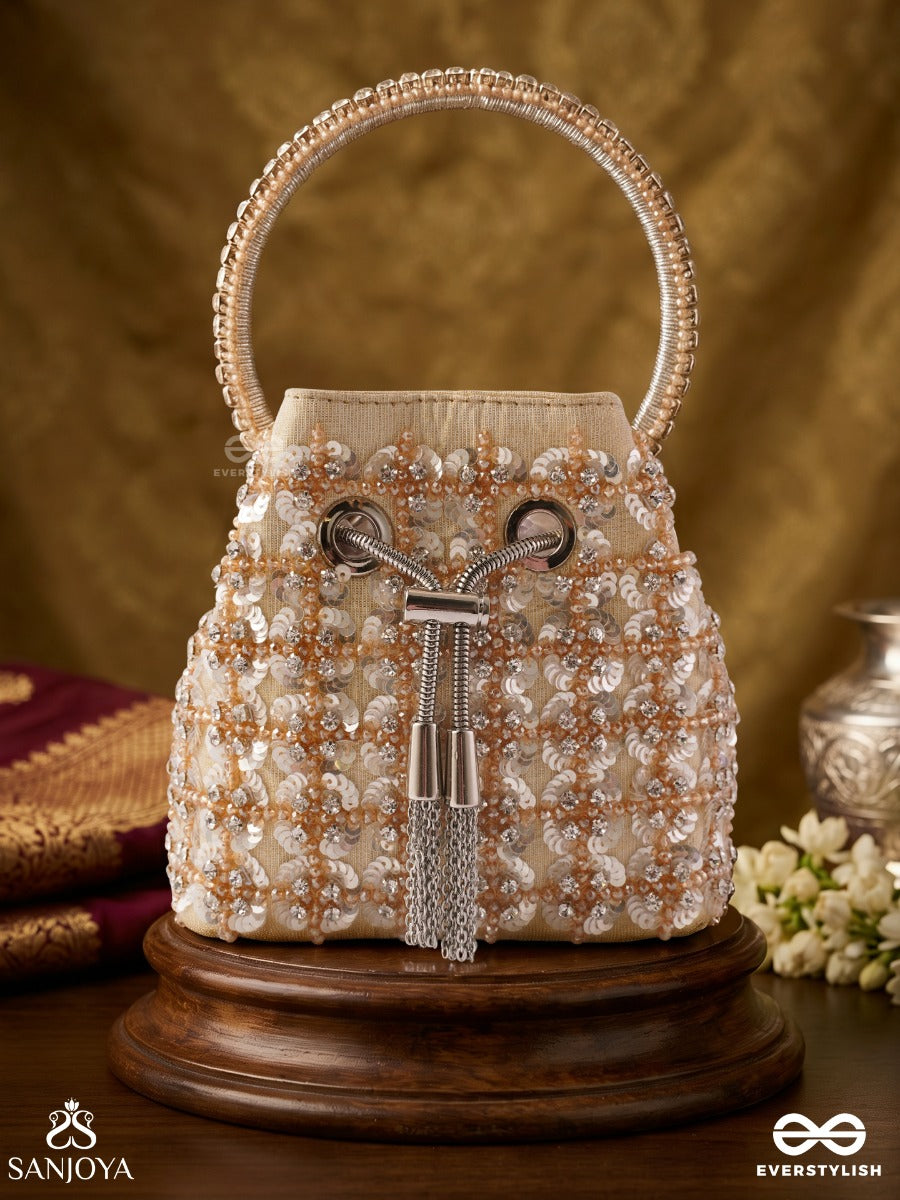 Mehryar – Bucket Ivory Base Bag With Pearl Lattice Texture, Metallic Drawstring And Ring Handle