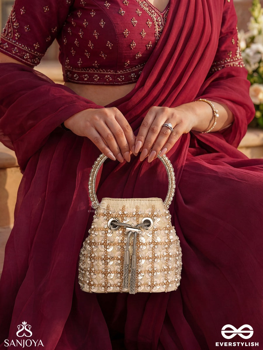 Mehryar – Bucket Ivory Base Bag With Pearl Lattice Texture, Metallic Drawstring And Ring Handle