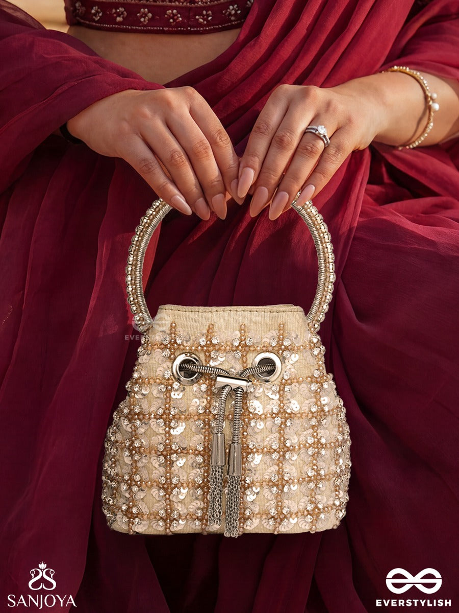 Mehryar – Bucket Ivory Base Bag With Pearl Lattice Texture, Metallic Drawstring And Ring Handle