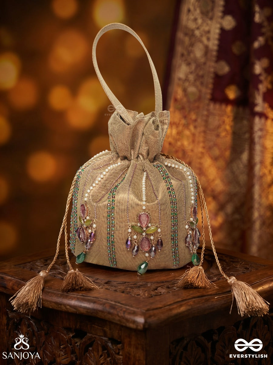 Shahgulnaar – Potli Warm Sand Bag With Jeweled Motif Work, Crystal Embellishments And Dangling Tassel Ends