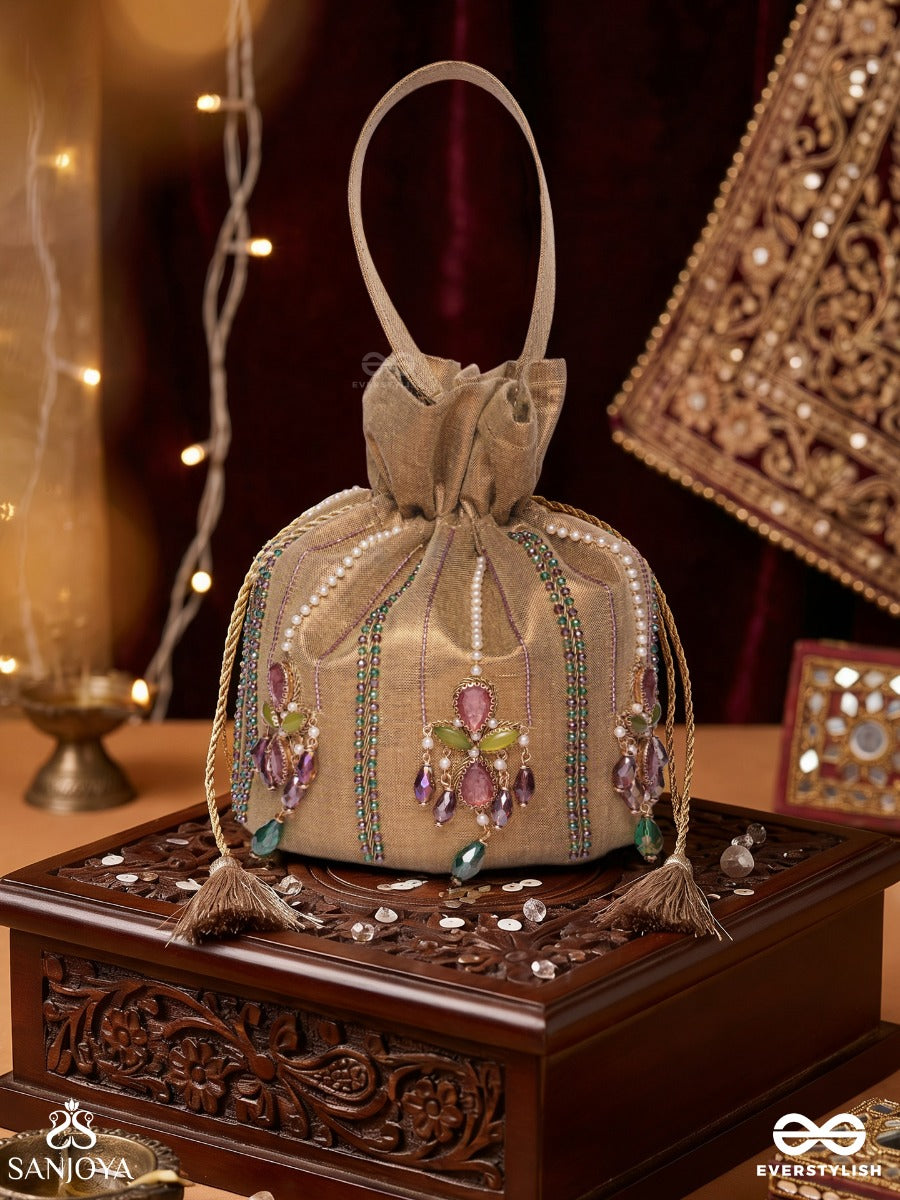 Shahgulnaar – Potli Warm Sand Bag With Jeweled Motif Work, Crystal Embellishments And Dangling Tassel Ends