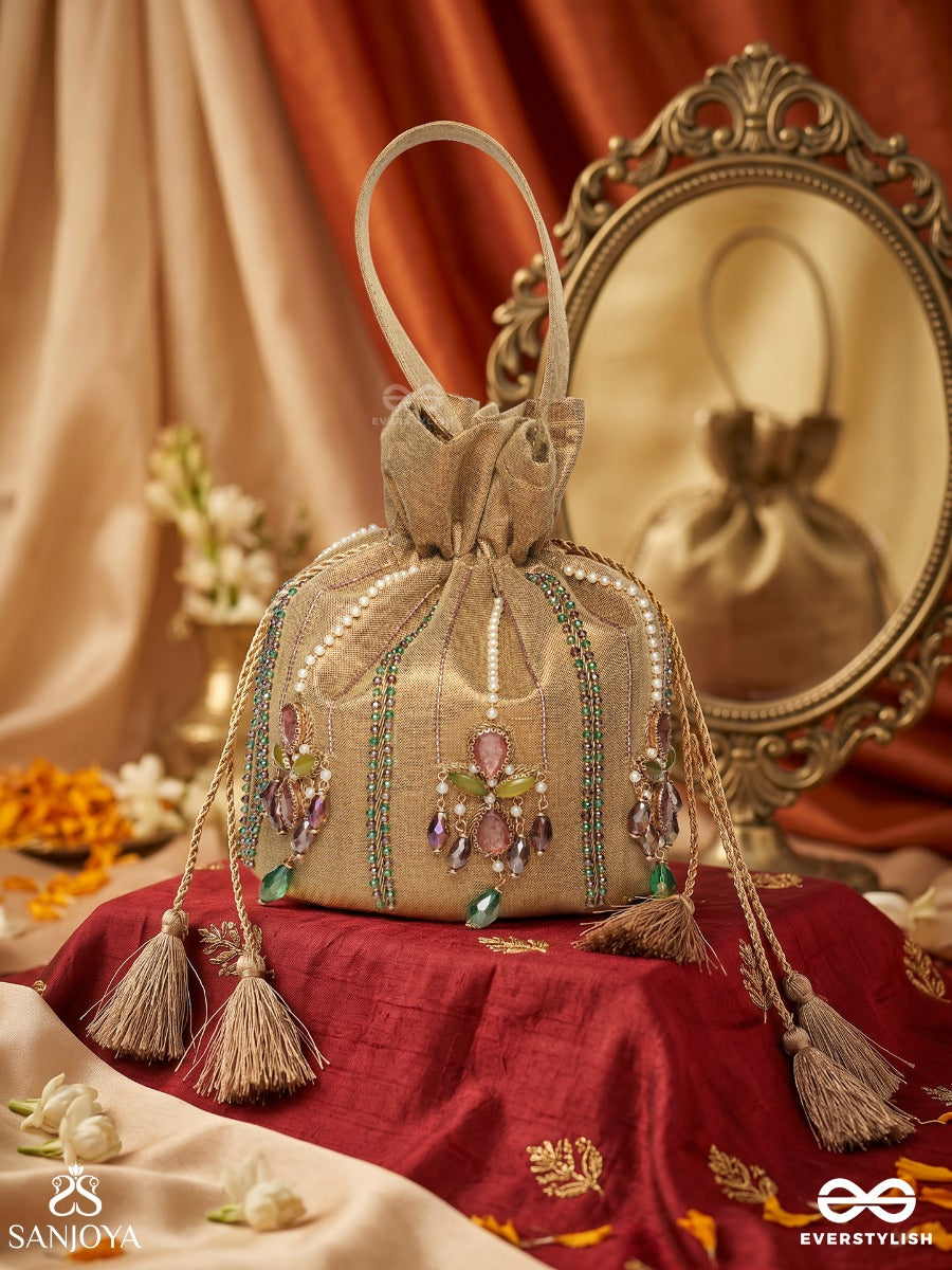 Shahgulnaar – Potli Warm Sand Bag With Jeweled Motif Work, Crystal Embellishments And Dangling Tassel Ends