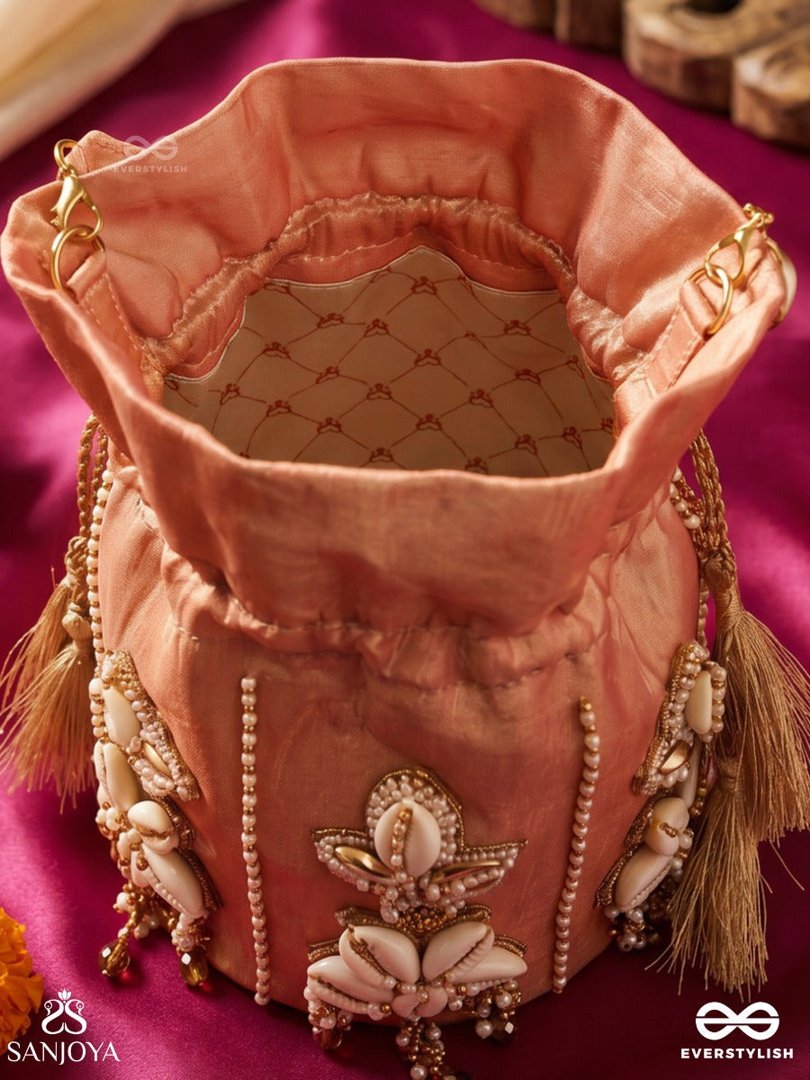 Zarmehrin – Potli Blush Pink Bag With Shell Floral Appliqué, Crystal Linework And Tassel Cords