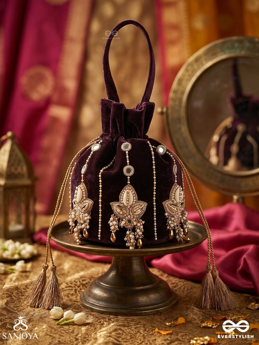 Shahzebaan – Potli Rich Wine Bag With Festive Appliqué Detailing, Pearl Highlights And Braided Tie Ends
