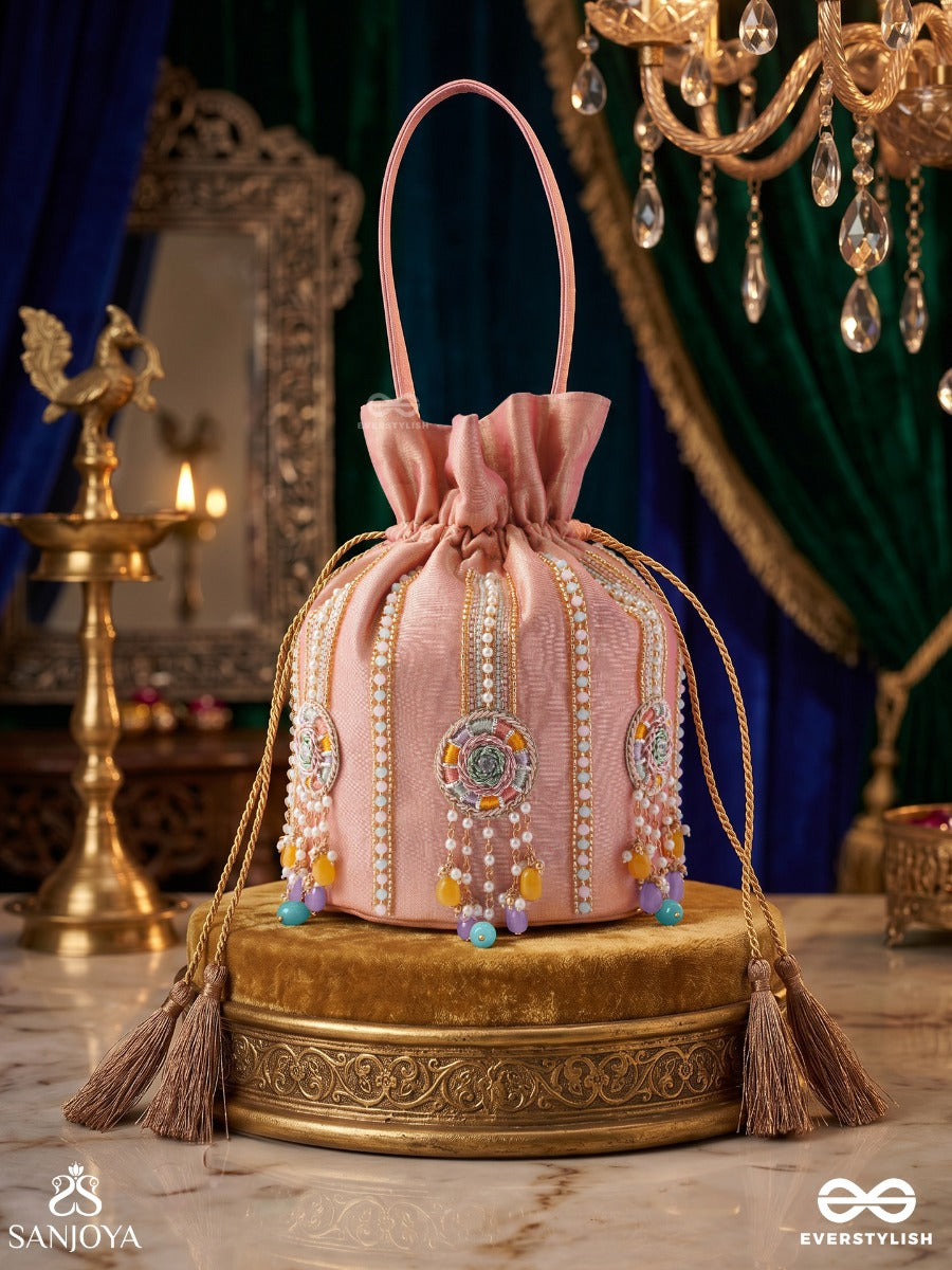Kainaat – Potli Soft Peach Bag With Multistone Detailing, Jeweled Line Accents And Side Tassels