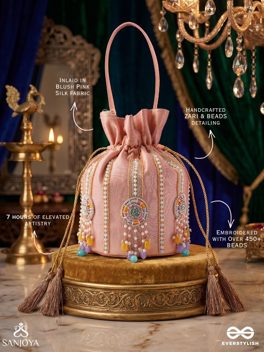 Kainaat – Potli Soft Peach Bag With Multistone Detailing, Jeweled Line Accents And Side Tassels