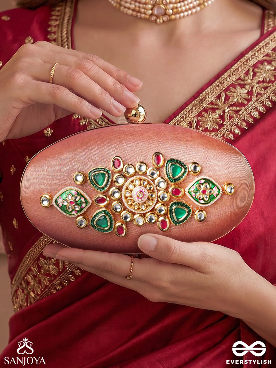 Kainaat – Oval Peach Silk Clutch With Kundan Ornamentation, Floral Enamel Work And Gem Highlights