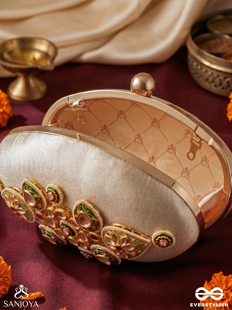 Shahgohar – Oval Ivory Silver Fabric Clutch With Kundan Cluster Design, Meenakari Embellishment And Floral Detailing