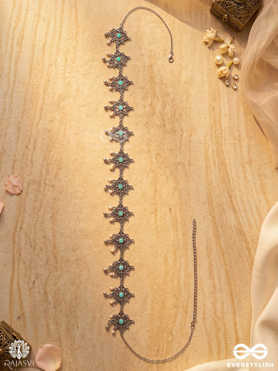 Parnavi – Oxidised Waist Chain With Floral Motifs And Green Stone Accents
