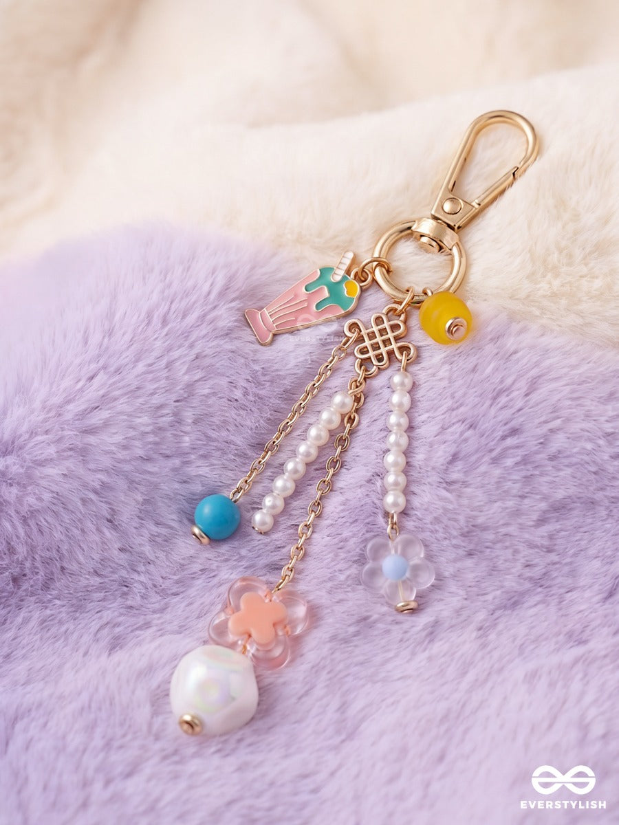 Pocket Bloom – Pastel Bag Charm With Floral And Pearl Details