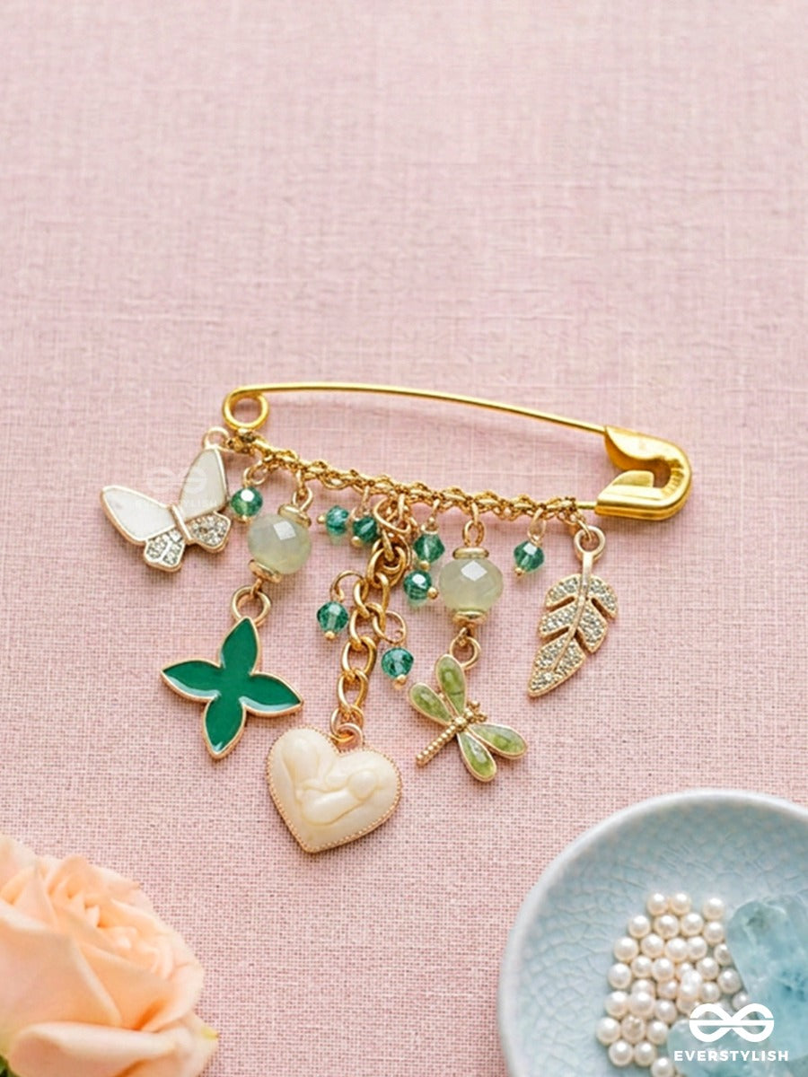 Emerald Whimsy – Gold-Tone Brooch Pin With Green Clover, Pearl Heart And Butterfly Charms