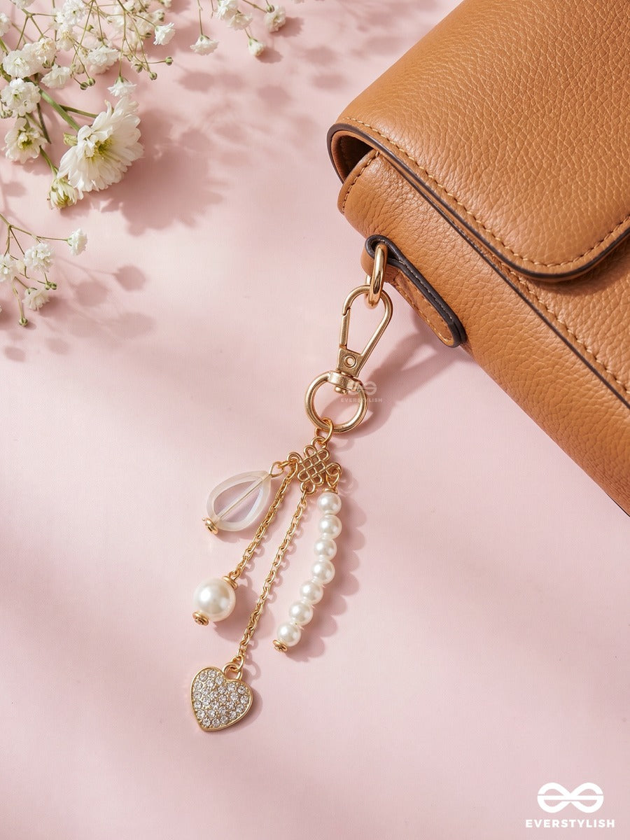 Pearl Perfection – Coquette Bag Charm With Bow Details