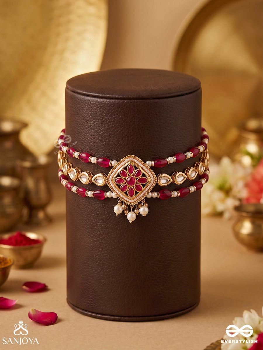 Kaushiki – Goddess Durga – Elegant Choker With Twin Red Bead Rows, Kundan Flower And Delicate Golden Details