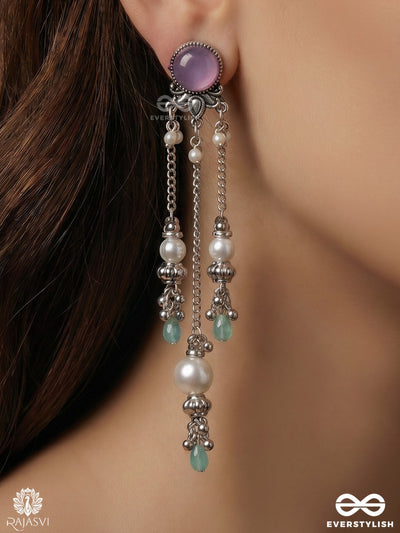 Lilavati – Oxidised Long Earrings With Lilac Stones, Floral Charms And Pearl Drops