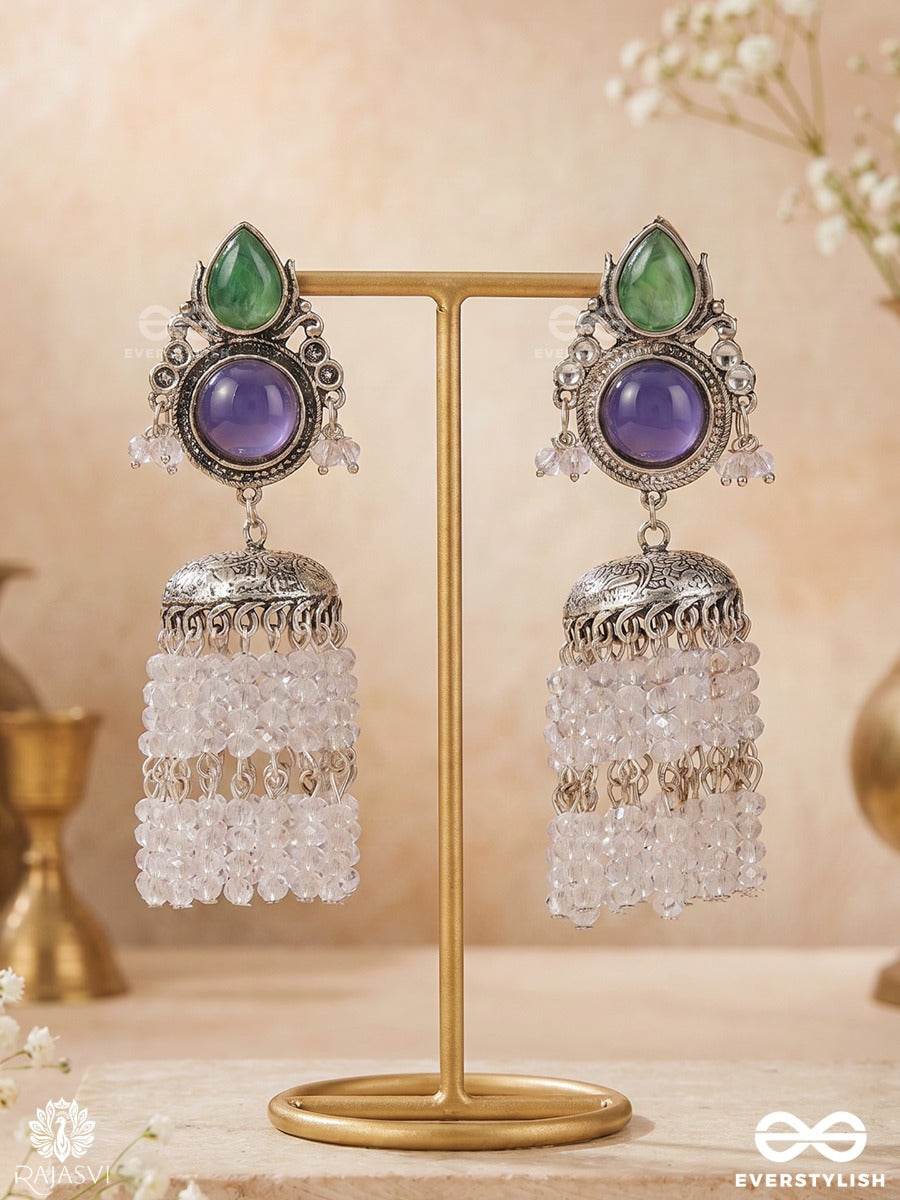 Indraneelika – Oxidised Tassel Earrings With Green Teardrop Stones, Indigo Accents And Pearl Cascades