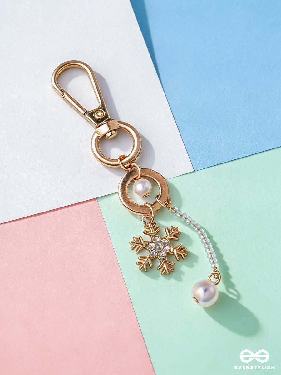 Star Dust – Pearl Bag Charm With Golden Star Details