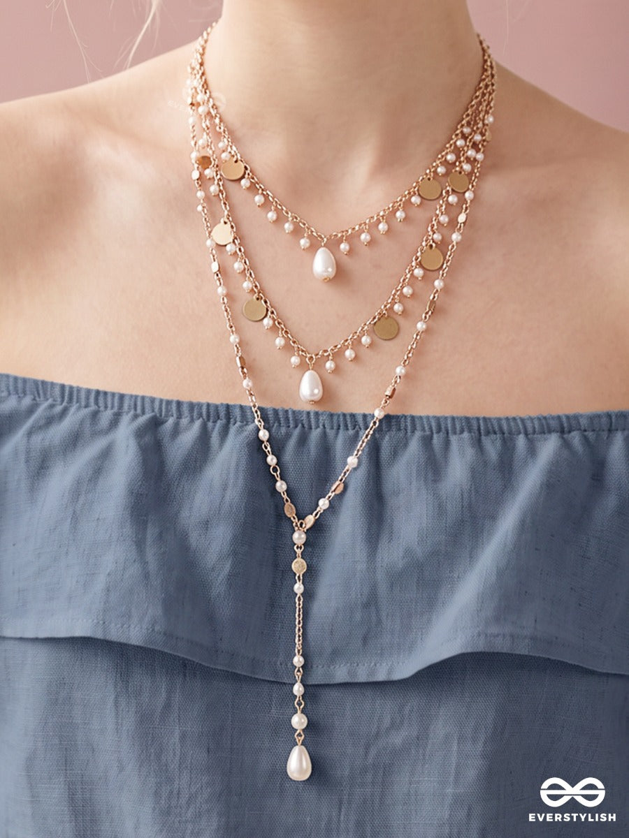 Heartsong – Triple-Layered Gold-Tone Necklace With Mini Heart Charms And Pearl Accents
