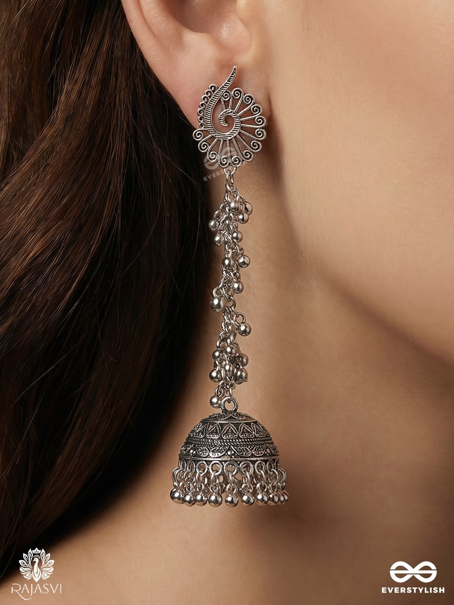 Noopurdhara – Oxidised Jhumka Earrings With Floral Studs, Ghungroo Clusters And Heritage Dome