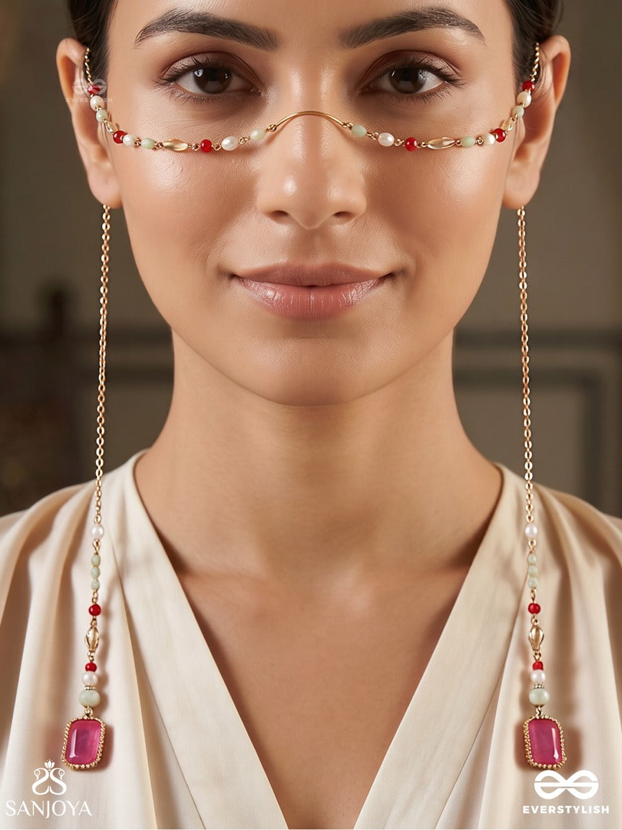 Gulabrekhi – Rose-Toned Trace – Elegant Face Let With Slender Gold-Tone Chains, Magenta Side Stones, Pearl Accents And Delicate Red Bead Details