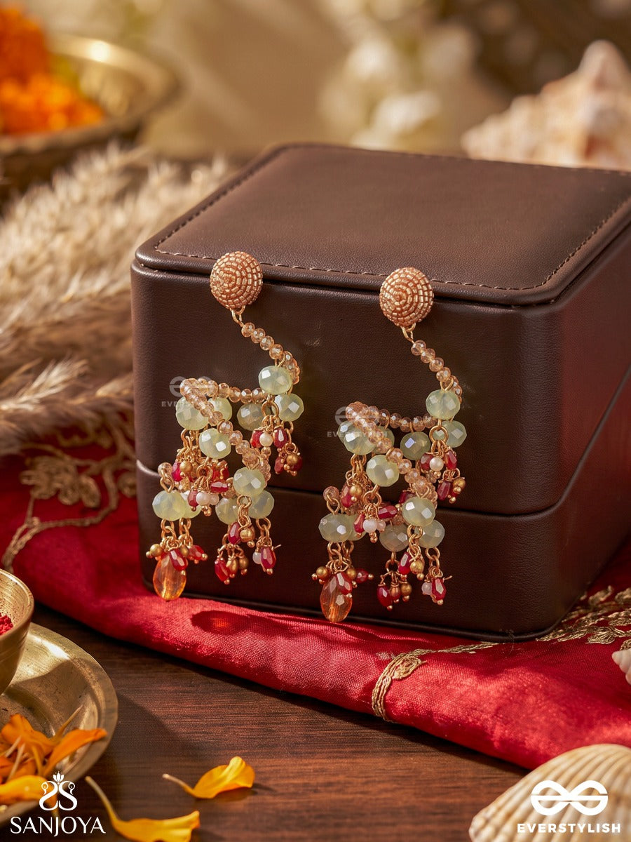 Vrishika – Scorpion Constellation – Sculptural Earrings With Spiral Pearl Strands, Green Gem Accents And Peach Crystal Drops